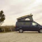 The Metris Getaway Van with rooftop tent on beach