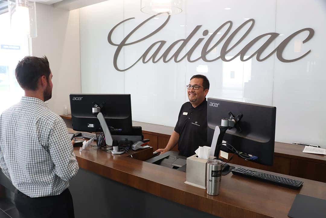 A Cadillac tire being serviced.