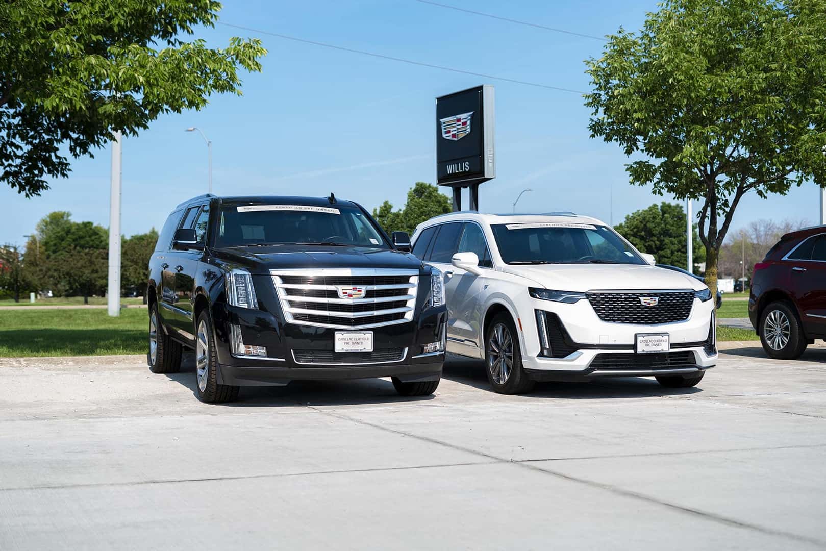 An exterior shot of a crossover and a sedan